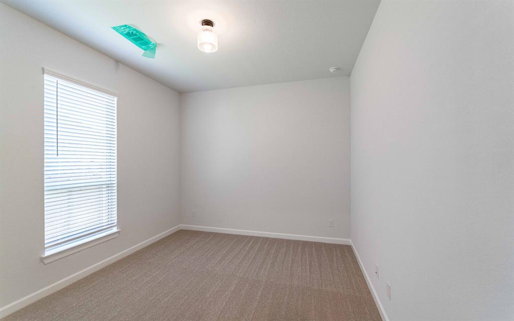 2008 Casting Ridge Mesquite, TX 75181 - Photo 18 of 24 an empty room with a window