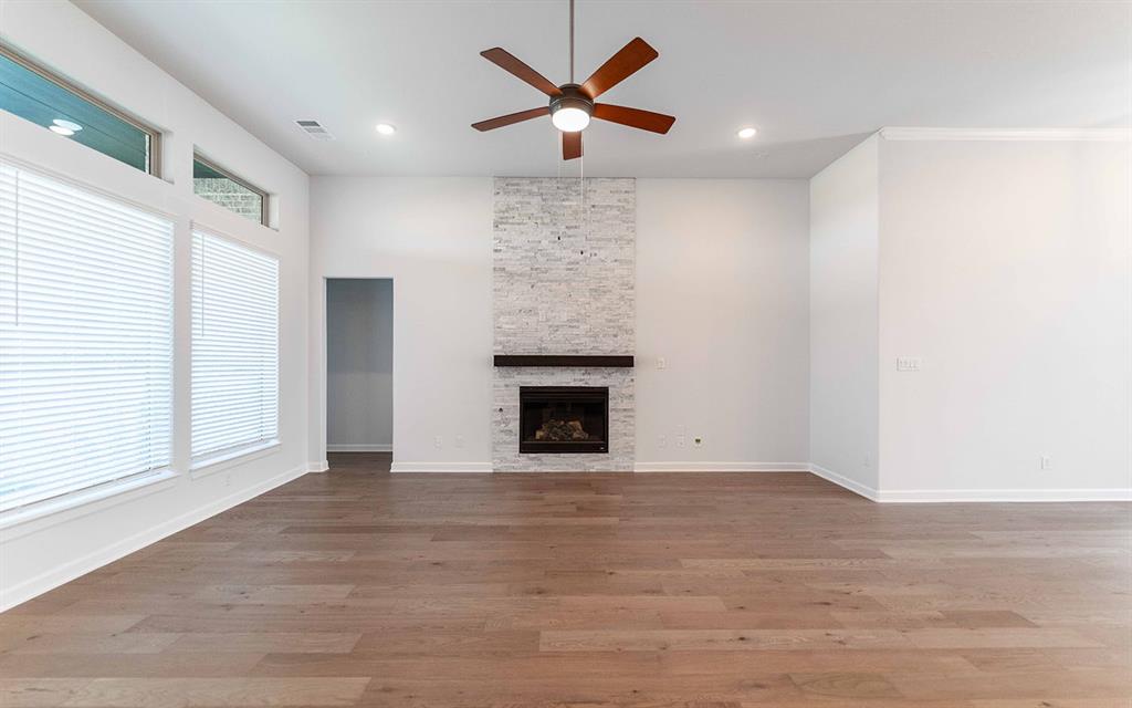 2008 Casting Ridge Mesquite, TX 75181 - Photo 2 of 24 an empty room with fan and windows