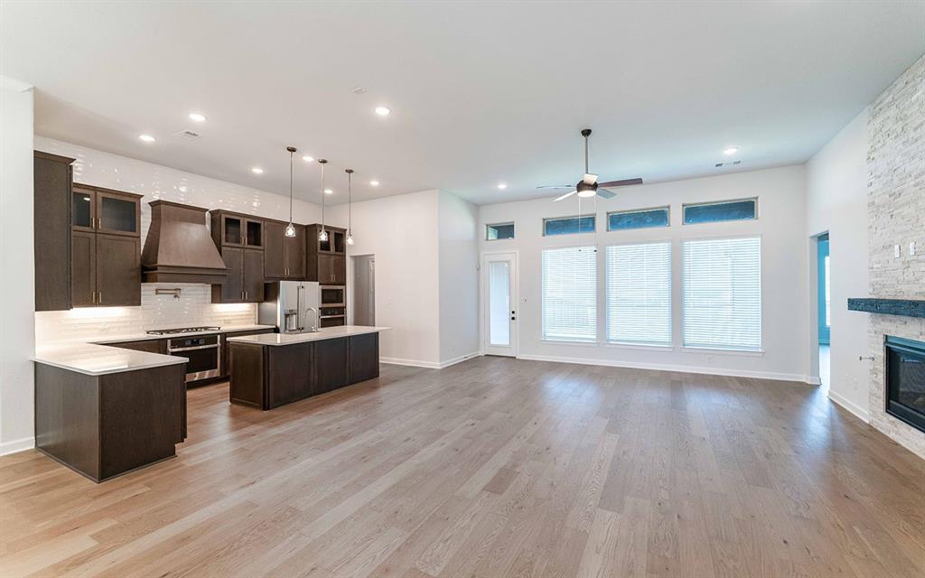 2008 Casting Ridge Mesquite, TX 75181 - Photo 5 of 24 a large kitchen with stainless steel appliances kitchen island a large counter top and a wooden floors