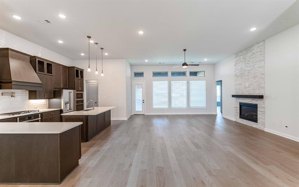 2008 Casting Ridge Mesquite, TX 75181 - Photo 6 of 24 a large kitchen with stainless steel appliances kitchen island a large counter top and a wooden floors