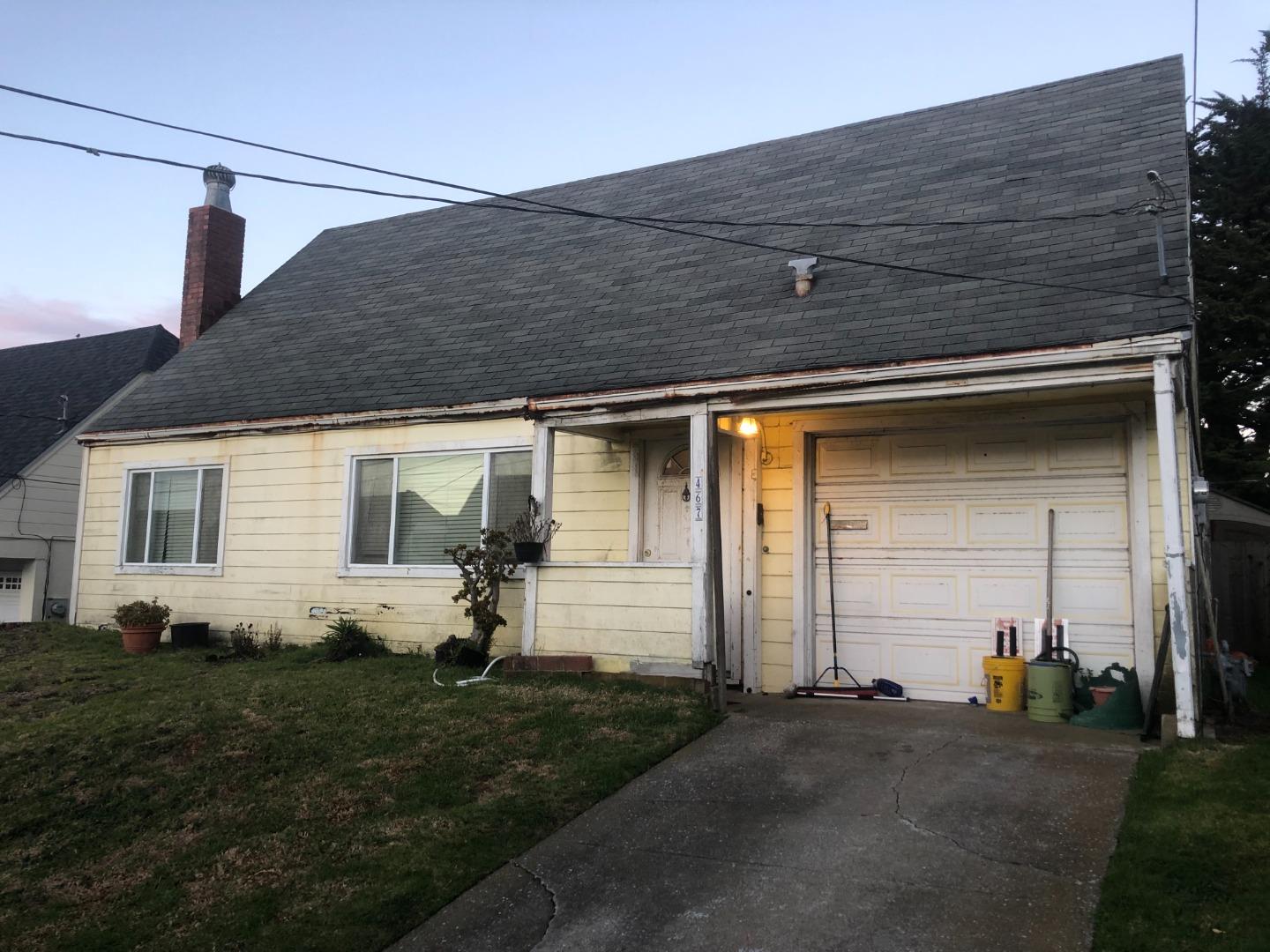 a front view of house with yard