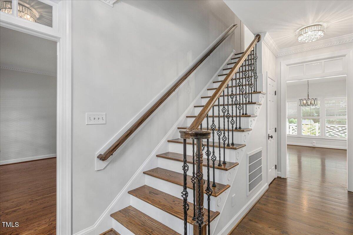 9228 Oneal Road Raleigh, NC 27613 - Photo 15 of 45 a view of entryway with wooden floor