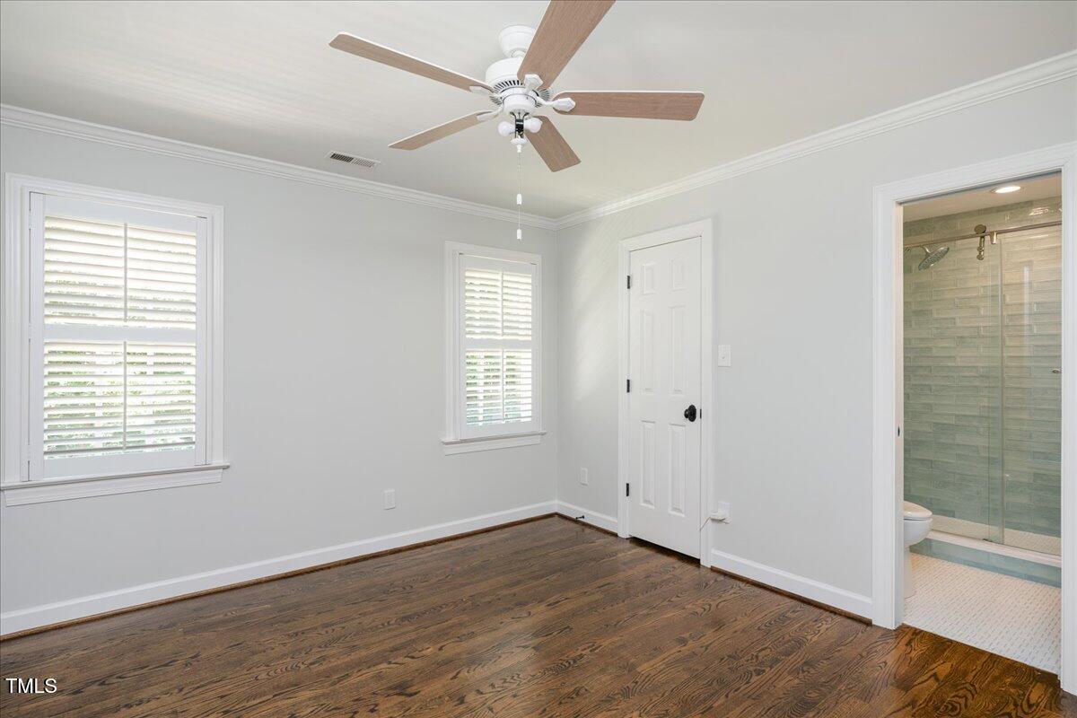 9228 Oneal Road Raleigh, NC 27613 - Photo 33 of 45 a view of an empty room with a window