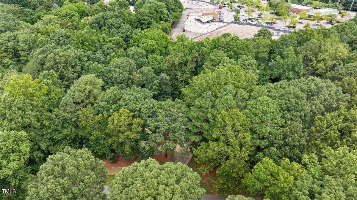 9228 Oneal Road Raleigh, NC 27613 - Photo 39 of 45 an aerial view of residential house with outdoor space and trees all around