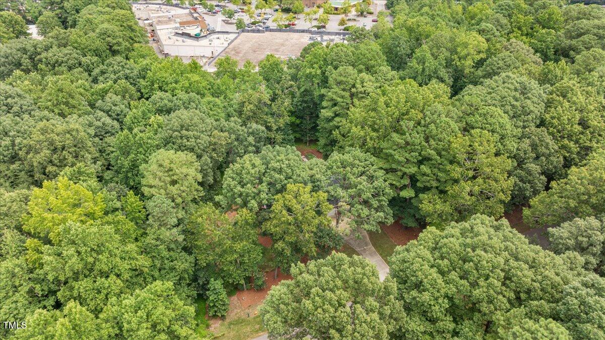 9228 Oneal Road Raleigh, NC 27613 - Photo 41 of 45 an aerial view of residential house with outdoor space and trees all around