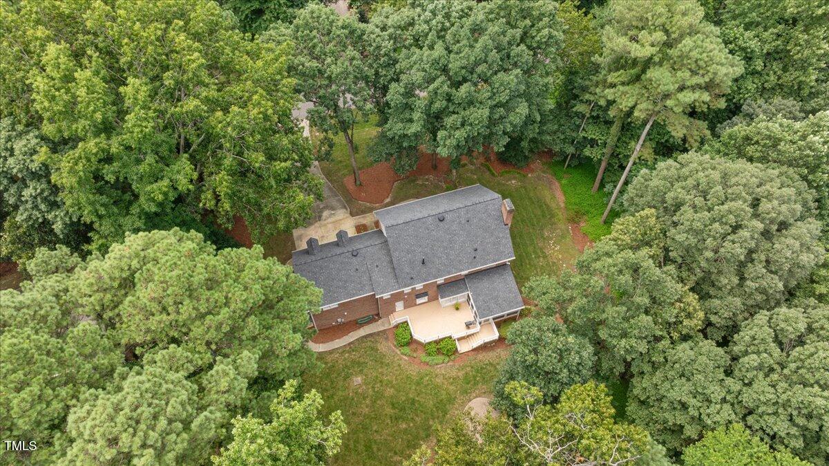 9228 Oneal Road Raleigh, NC 27613 - Photo 44 of 45 an aerial view of a house with a yard and lake view