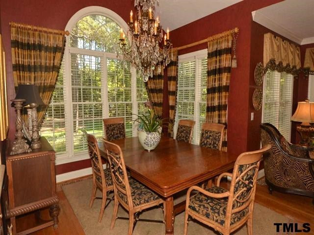 1701 Liatris Lane Raleigh, NC 27613 - Photo 9 of 25 LARGE BREAKFAST AREA, PALLADIUM WINDOW, HW FLOORS, VAULTED CEILING Breakfast Area