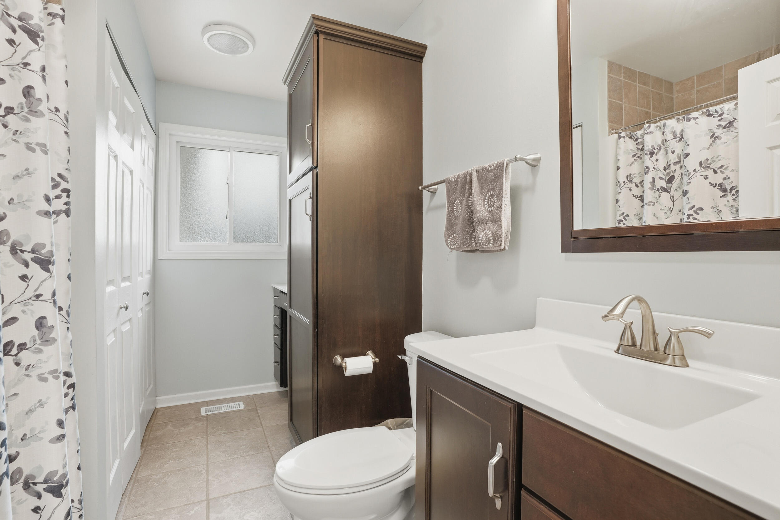 1437 Madison Avenue Dyer, IN 46311 - Photo 16 of 25 a bathroom with a sink a toilet and shower