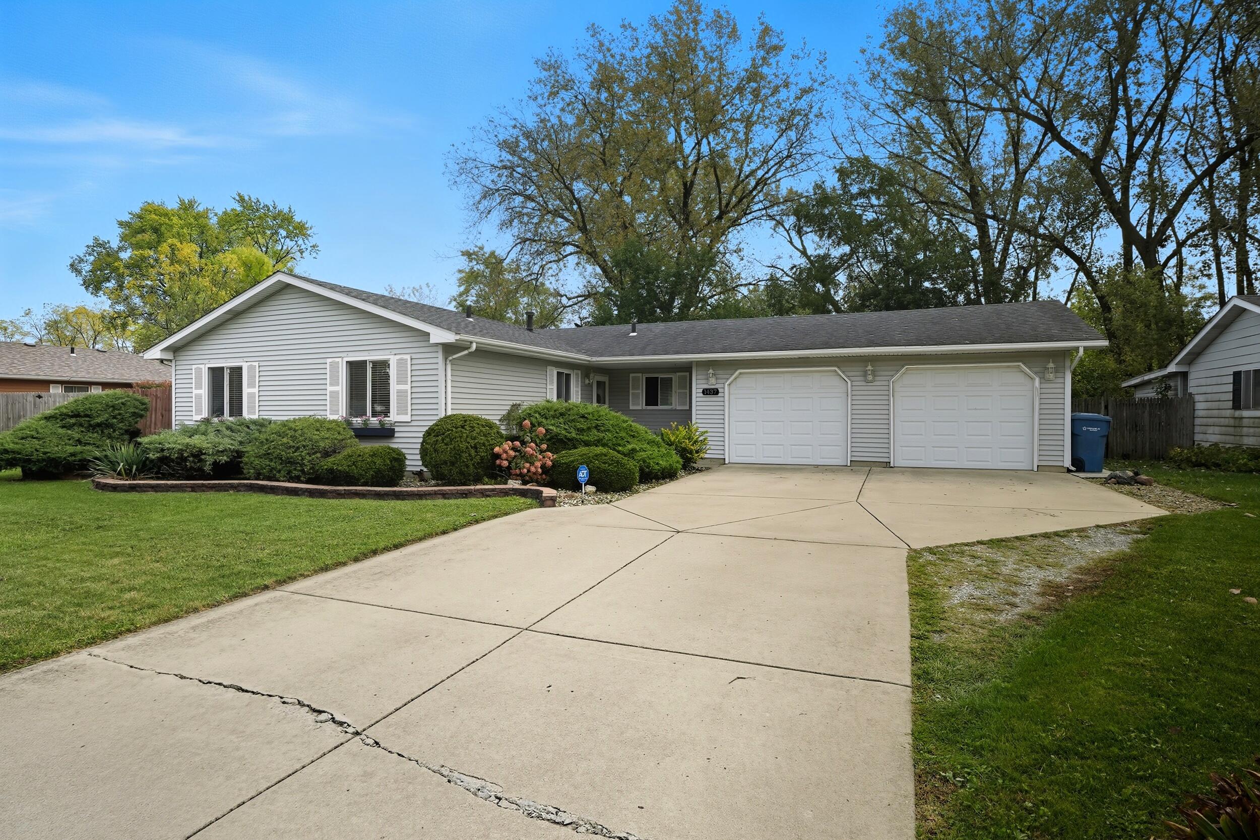 1437 Madison Avenue Dyer, IN 46311 - Photo 2 of 25 a front view of house with yard and green space