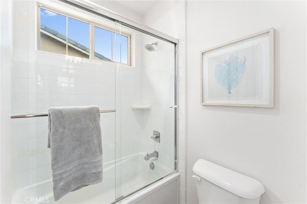 287 Barnes Road Tustin, CA 92782 - Photo 37 of 54 a bathroom with a shower a toilet and a sink