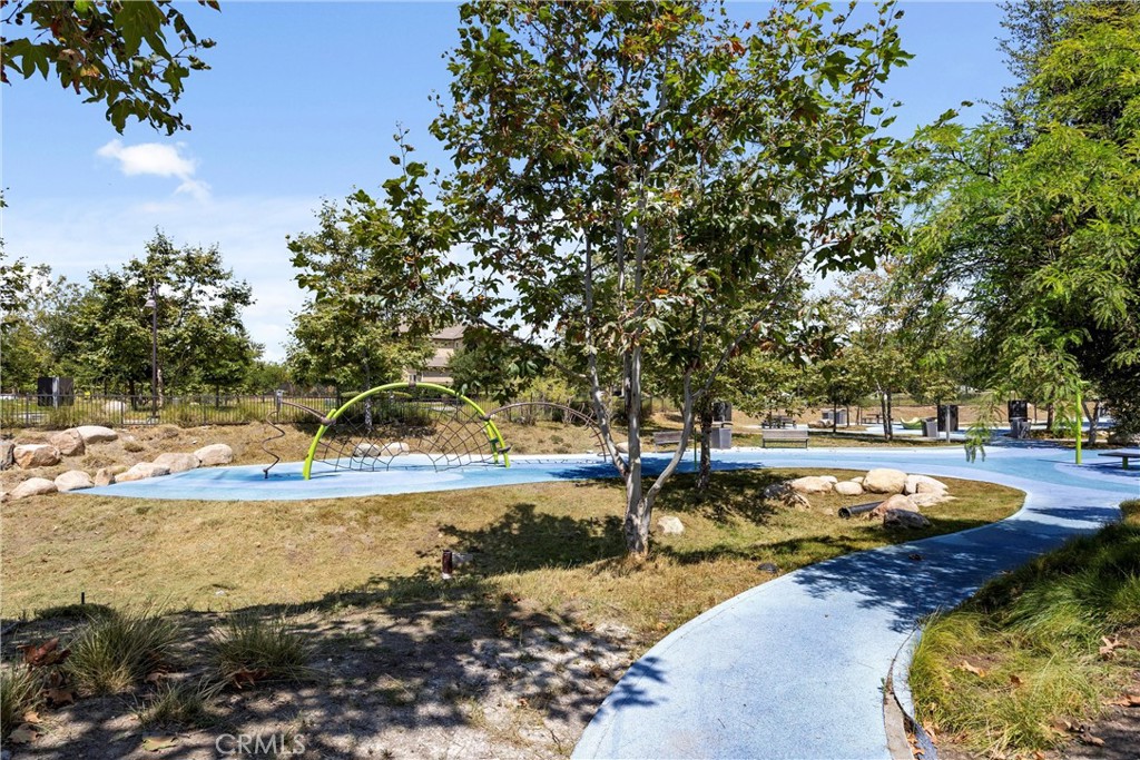 287 Barnes Road Tustin, CA 92782 - Photo 45 of 54 a view of a backyard with swimming pool