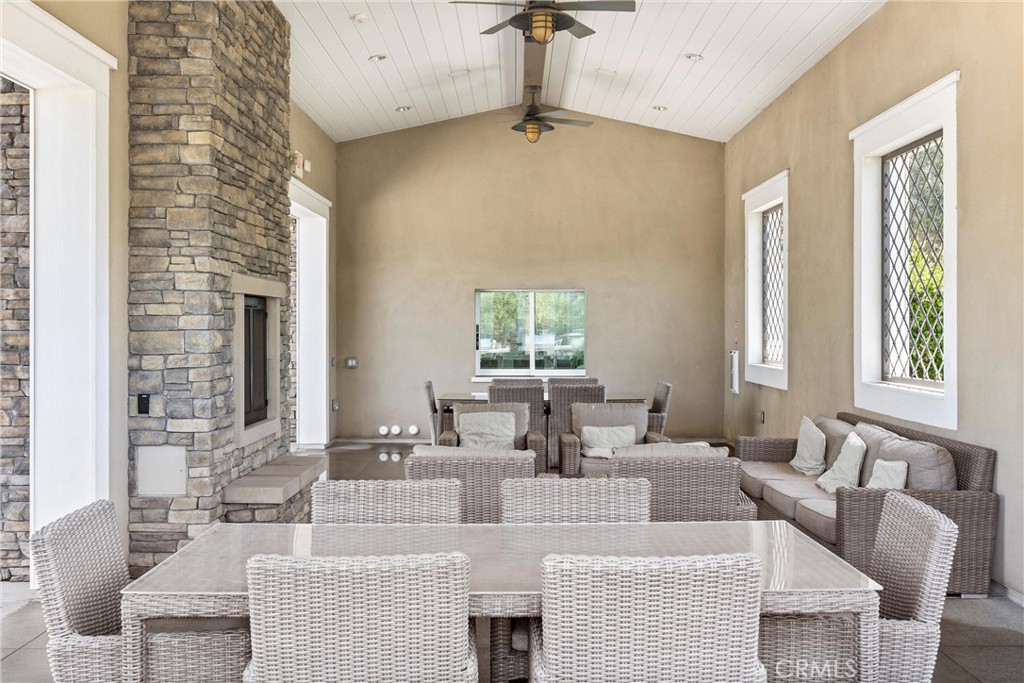 287 Barnes Road Tustin, CA 92782 - Photo 49 of 54 a living room with fireplace furniture and a window