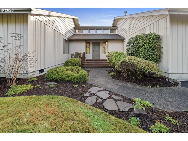 a view of a back yard of the house