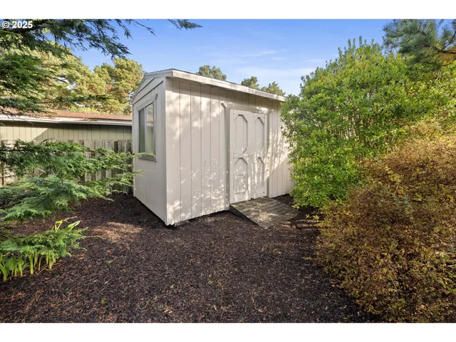 a view of balcony with wooden floor