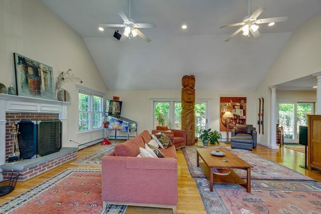 65 Wachusett Road Needham, MA 02492 - Photo 11 of 42 a living room with furniture chandelier and a fireplace