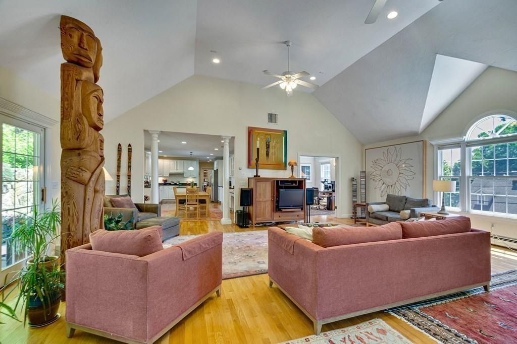 65 Wachusett Road Needham, MA 02492 - Photo 12 of 42 a living room with furniture fireplace and a large window