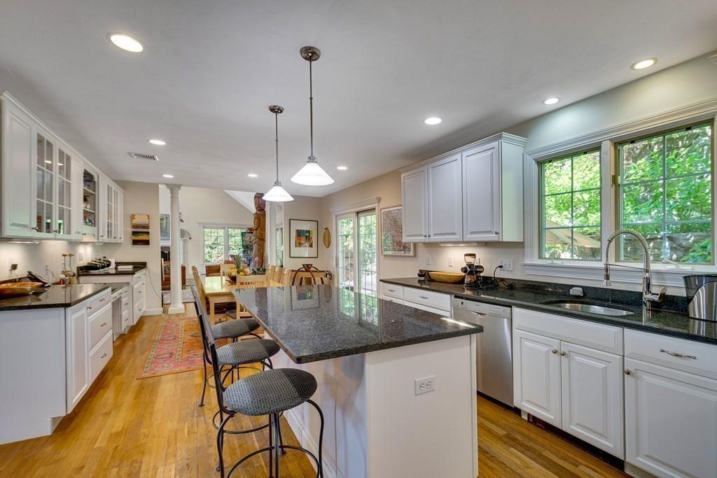 65 Wachusett Road Needham, MA 02492 - Photo 13 of 42 a kitchen with stainless steel appliances granite countertop counter space a sink and cabinets