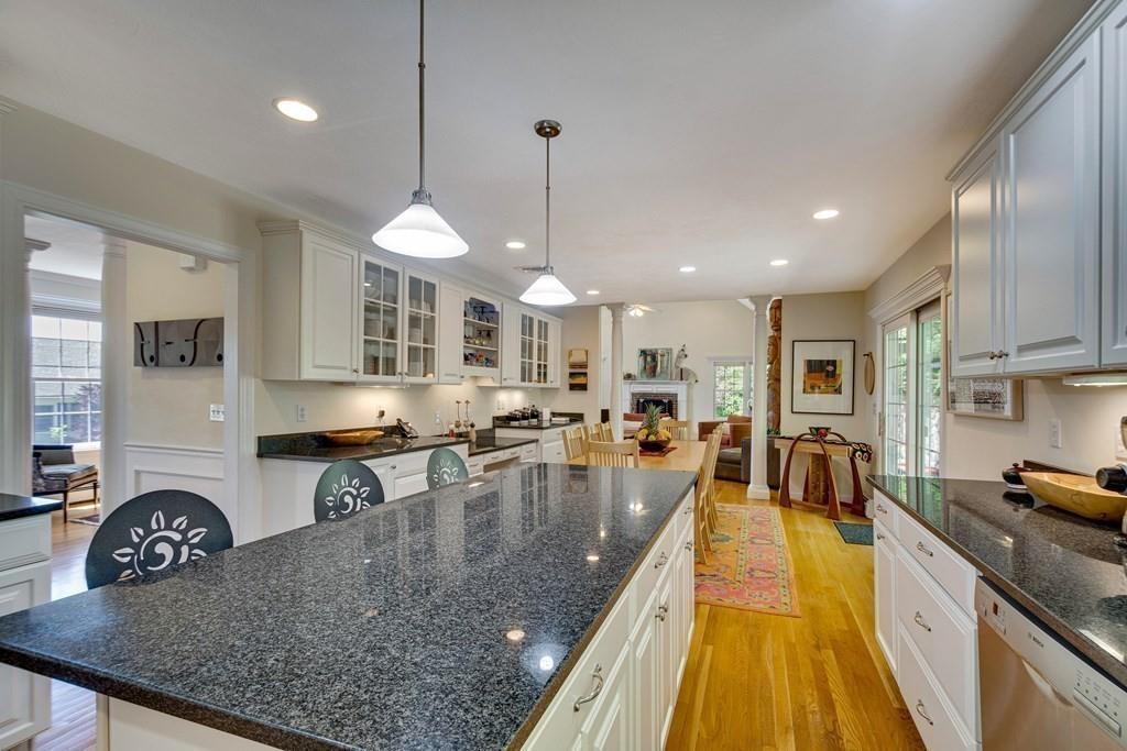 65 Wachusett Road Needham, MA 02492 - Photo 14 of 42 a kitchen with counter space appliances and a view of living room
