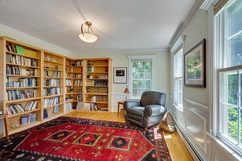 65 Wachusett Road Needham, MA 02492 - Photo 21 of 42 a bedroom with furniture and a book shelf