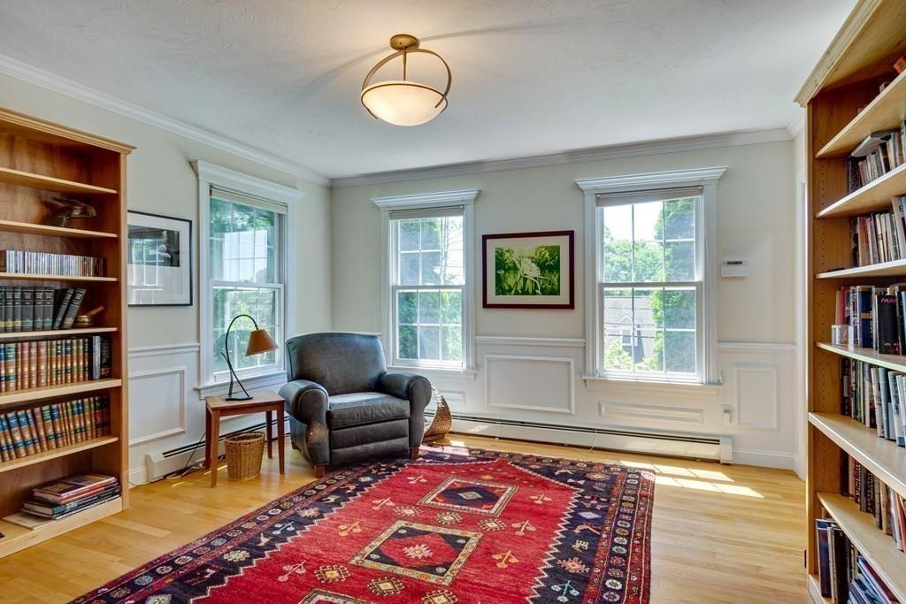 65 Wachusett Road Needham, MA 02492 - Photo 22 of 42 a living room with furniture and a book shelf