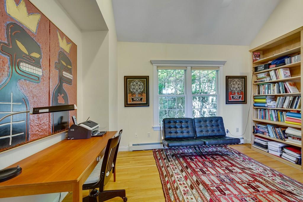 65 Wachusett Road Needham, MA 02492 - Photo 24 of 42 a room with furniture and a book shelf