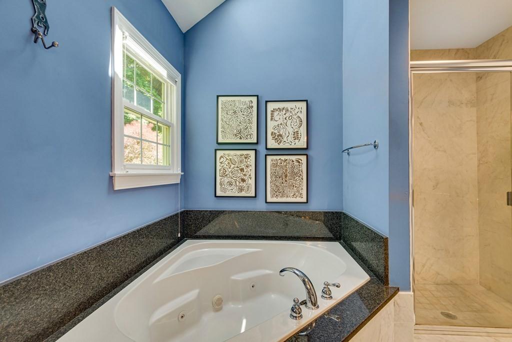 65 Wachusett Road Needham, MA 02492 - Photo 29 of 42 a bathroom with a bathtub and window