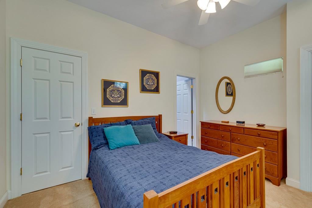 65 Wachusett Road Needham, MA 02492 - Photo 35 of 42 a bedroom with a bed and a dresser