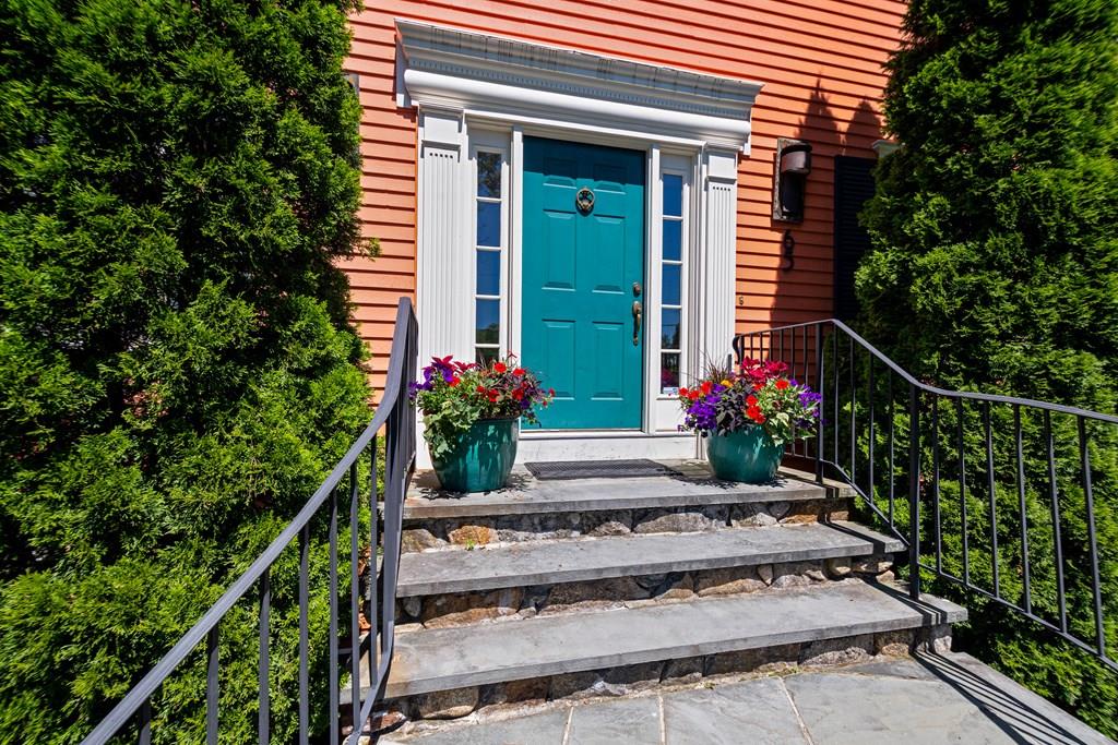 65 Wachusett Road Needham, MA 02492 - Photo 4 of 42 a view of a house with potted plants
