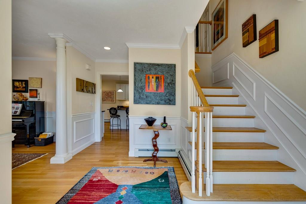 65 Wachusett Road Needham, MA 02492 - Photo 5 of 42 a view of a hallway with furniture and entryway