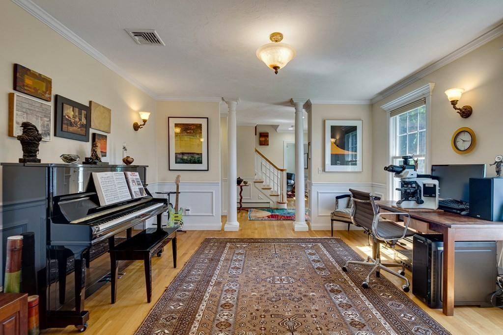 65 Wachusett Road Needham, MA 02492 - Photo 8 of 42 a living room with furniture and a wooden floor