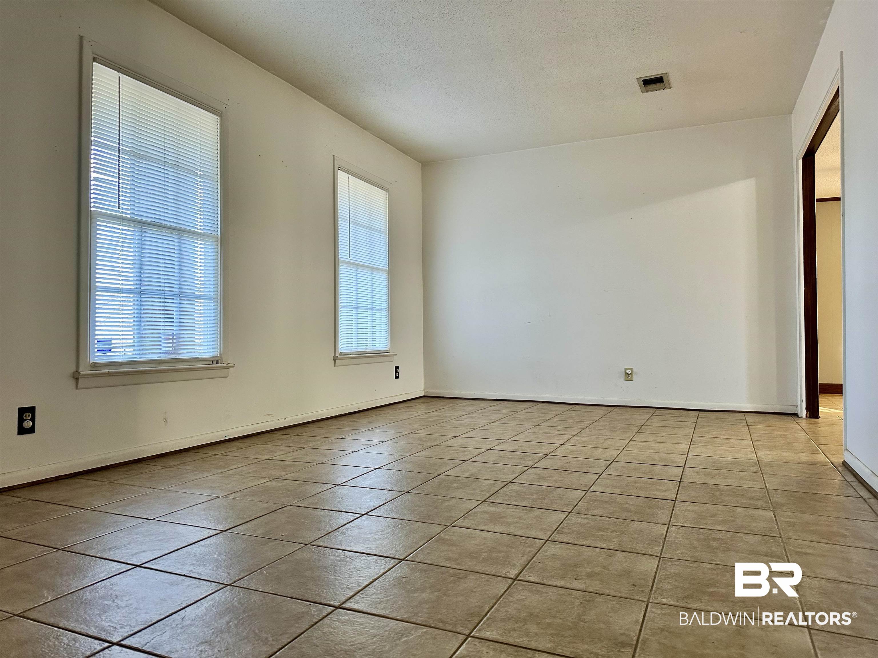 2664 Sowell Road Brewton, AL 36426 - Photo 6 of 12 View of tiled empty room