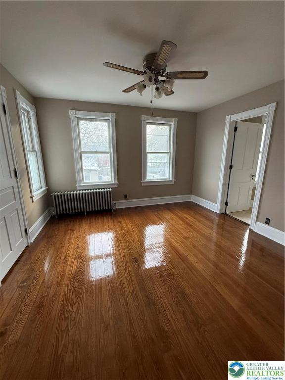 170 North Whitfield Street, Unit 2 Nazareth, PA 18064 - Photo 8 of 12 wooden floor in an empty room with a window