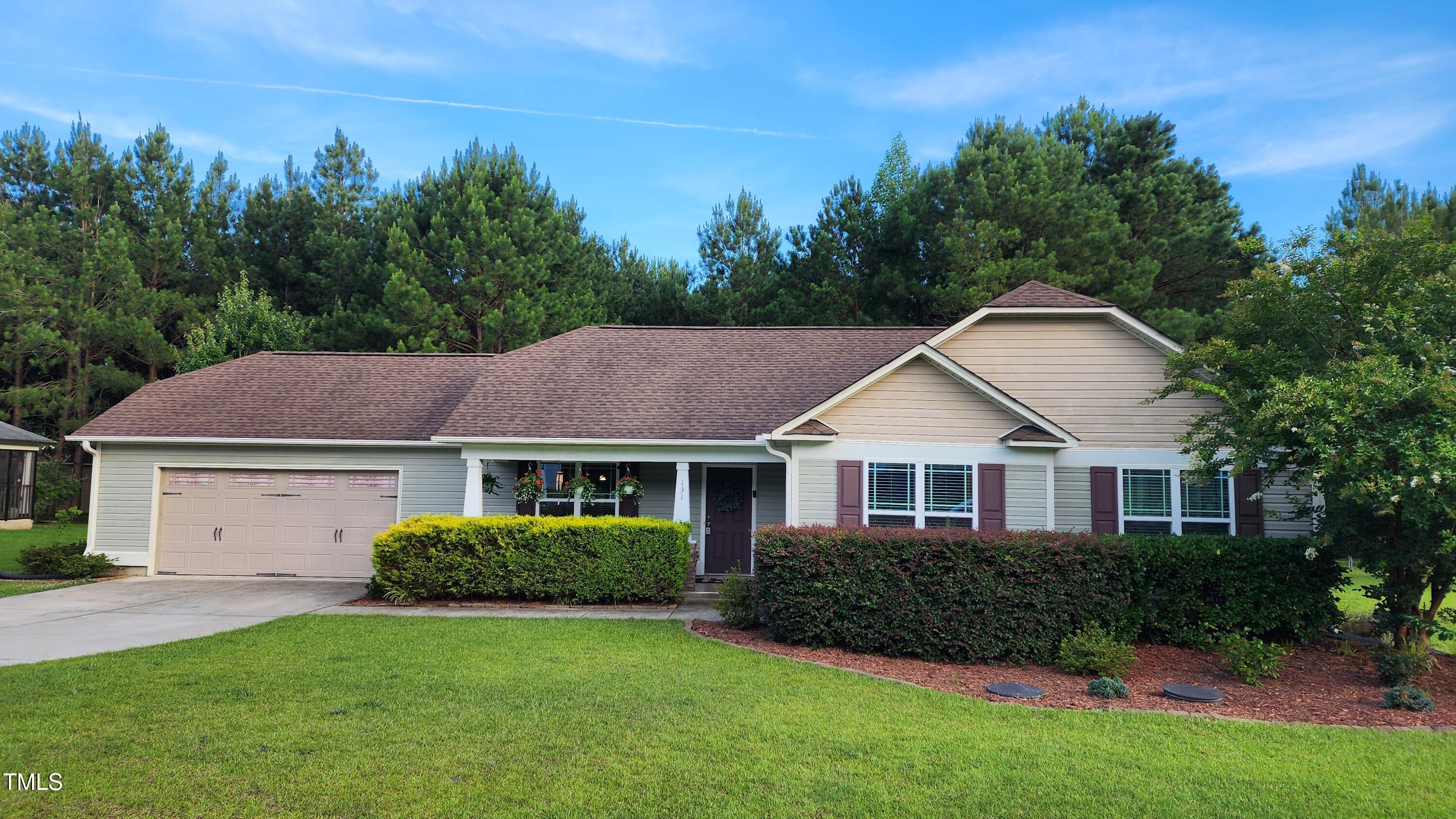 131 Abacos Court Clayton, NC 27520 - Photo 1 of 39 a house that has a lot of plants in it