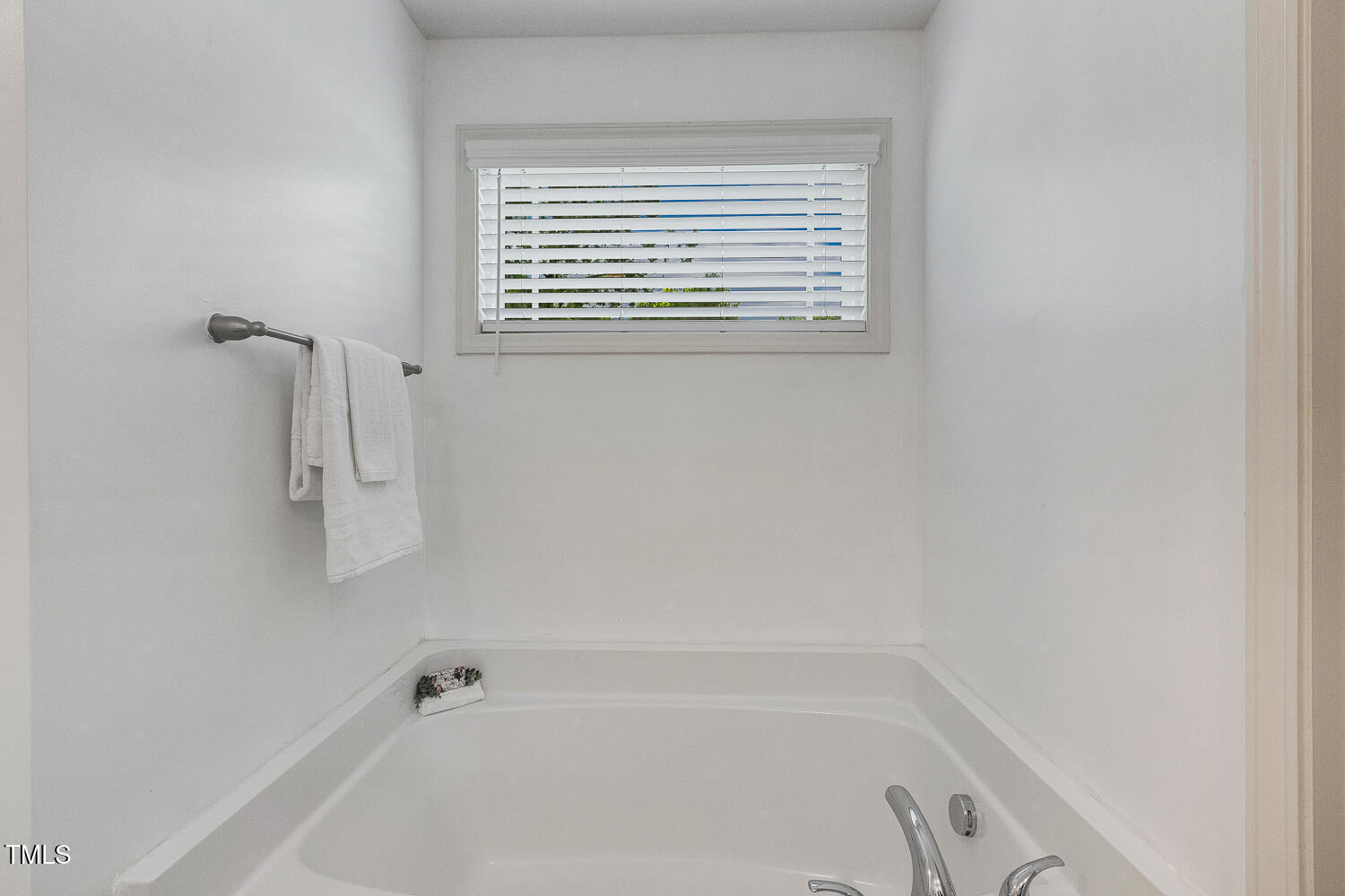 131 Abacos Court Clayton, NC 27520 - Photo 22 of 39 a close up of a bathtub
