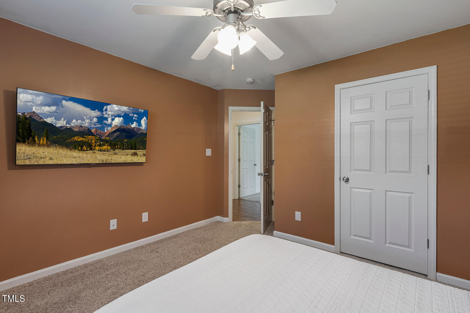 131 Abacos Court Clayton, NC 27520 - Photo 24 of 39 a view of an empty room with a window