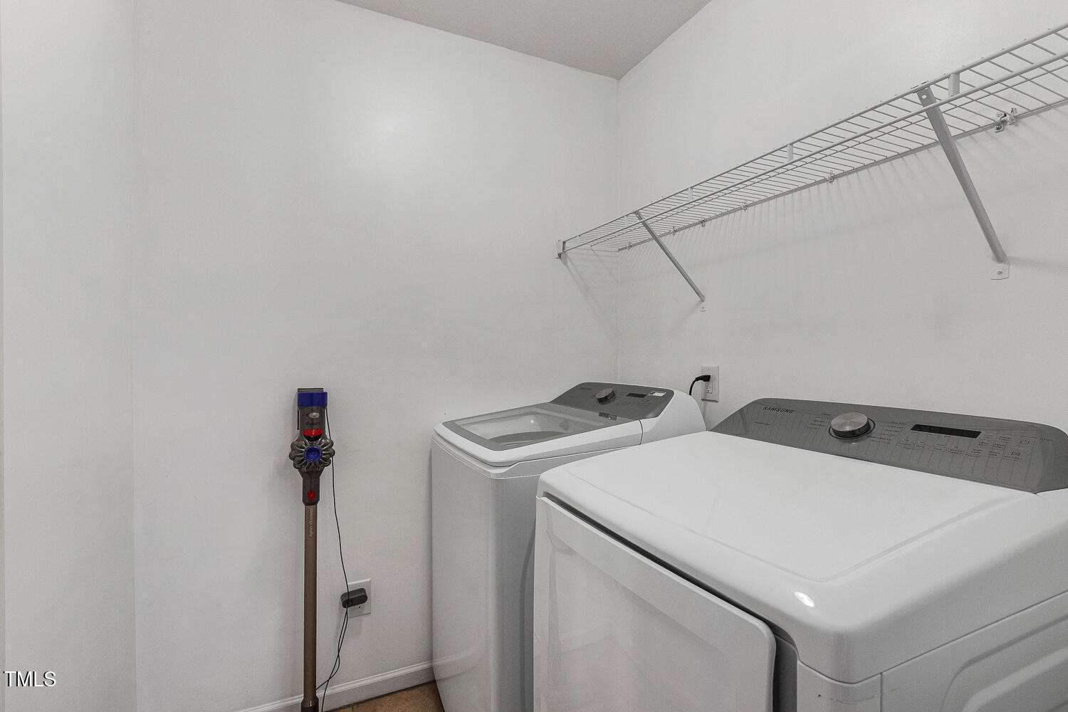 131 Abacos Court Clayton, NC 27520 - Photo 28 of 39 a utility room with dryer and washer