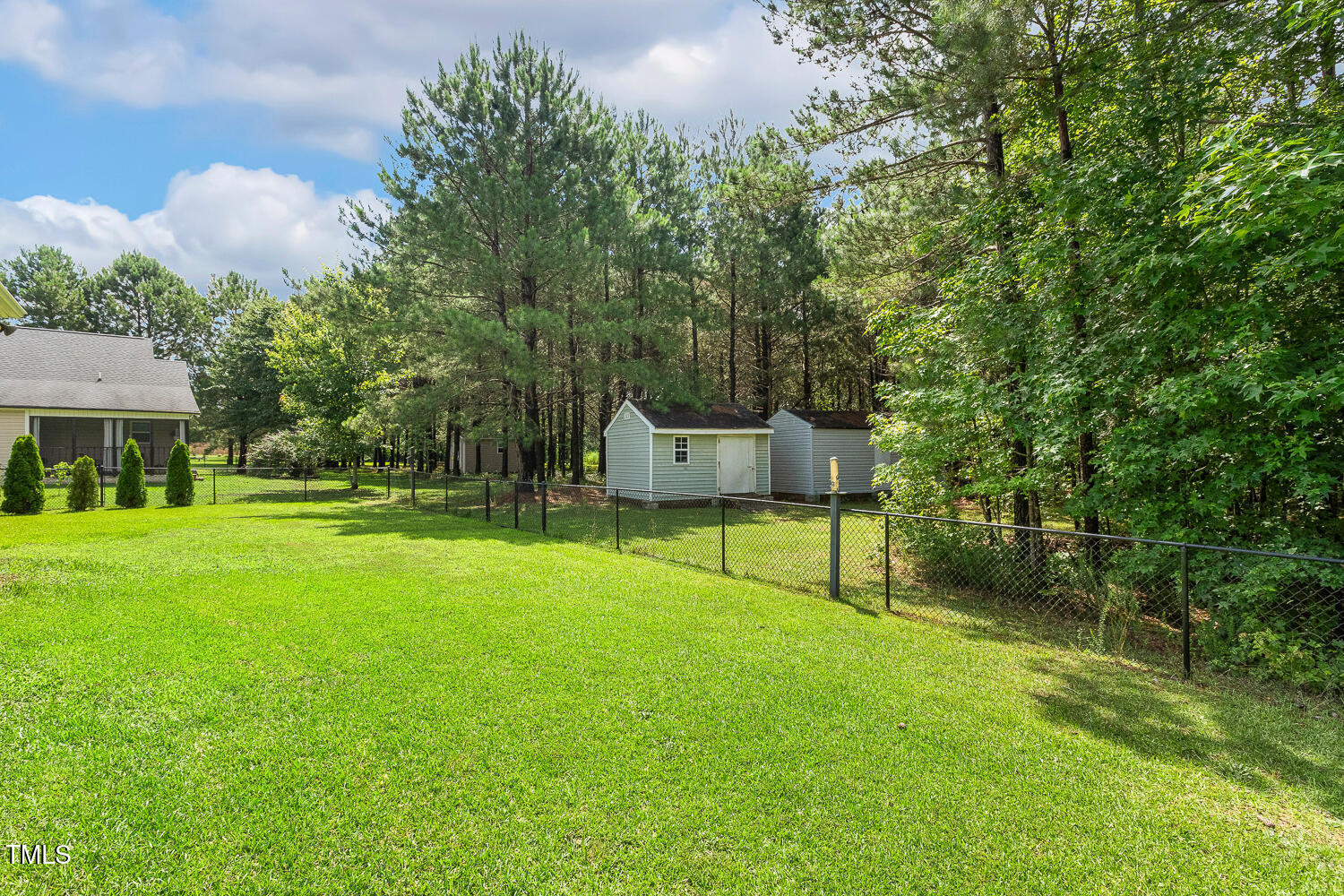 131 Abacos Court Clayton, NC 27520 - Photo 34 of 39 a view of a house with a backyard
