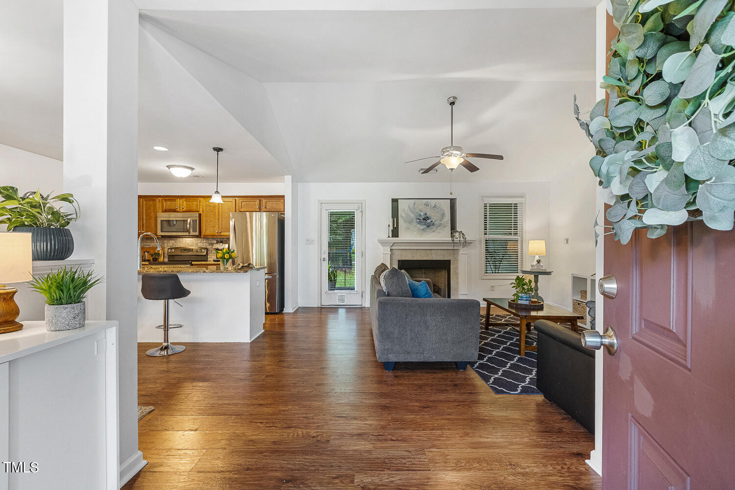 131 Abacos Court Clayton, NC 27520 - Photo 5 of 39 a living room with furniture and a fireplace