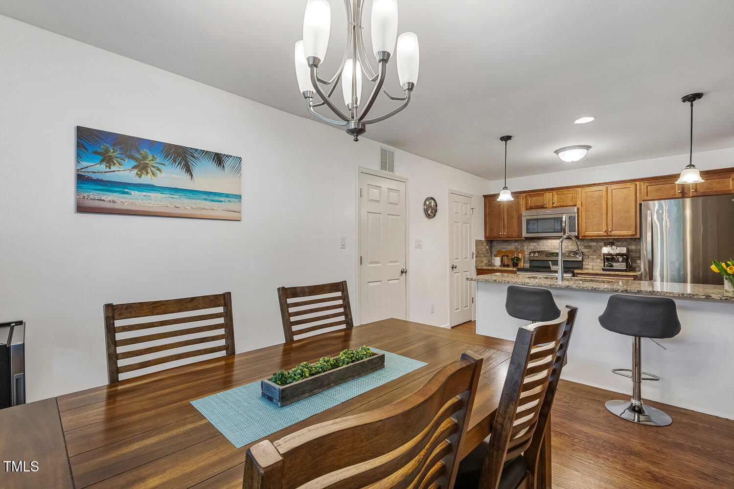 131 Abacos Court Clayton, NC 27520 - Photo 10 of 39 a view of kitchen with dining table and chairs