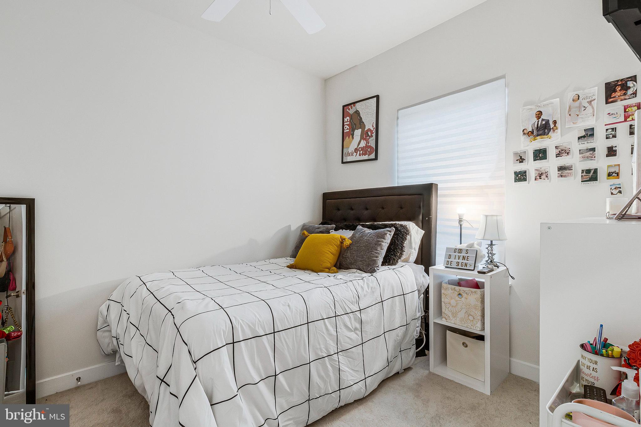 16504 Caribbean Way Accokeek, MD 20607 - Photo 16 of 29 a bedroom with a bed and dresser