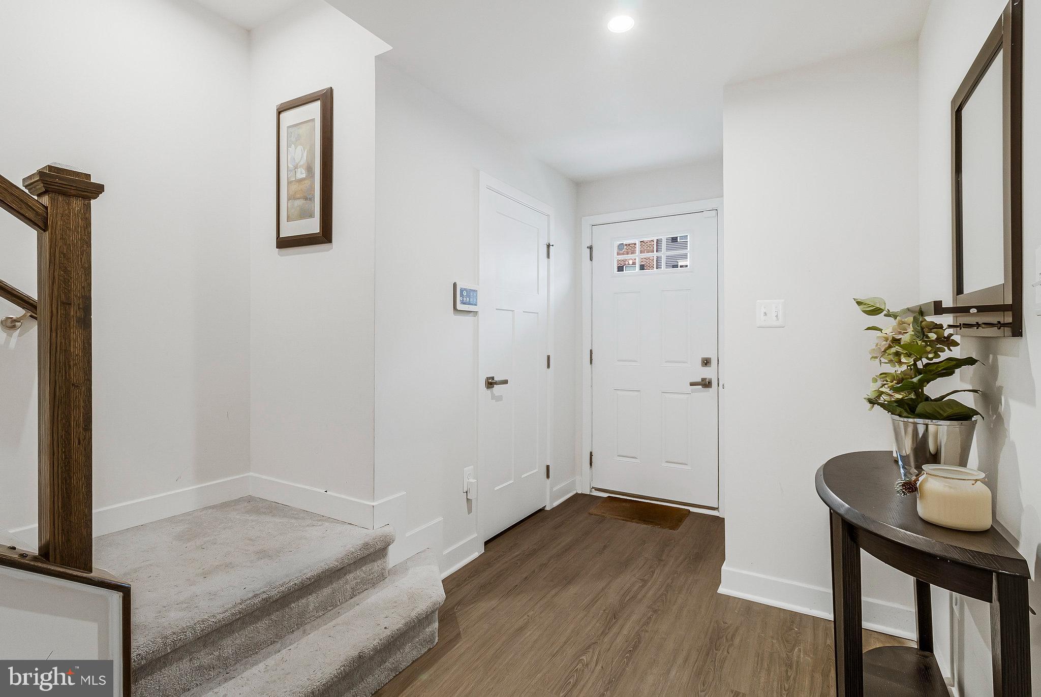 16504 Caribbean Way Accokeek, MD 20607 - Photo 2 of 29 a view of a livingroom with a table and workspace