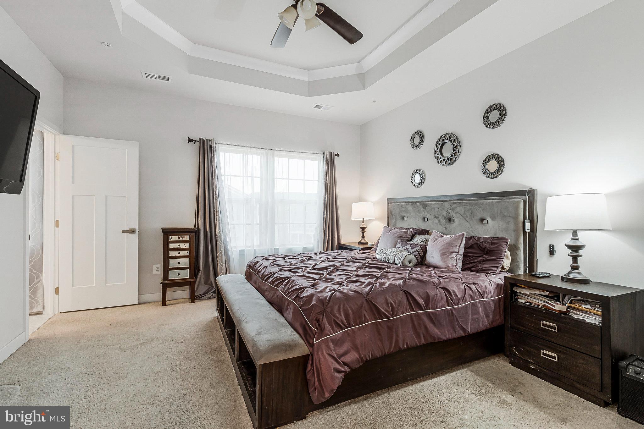 16504 Caribbean Way Accokeek, MD 20607 - Photo 22 of 29 a bedroom with a bed and a closet