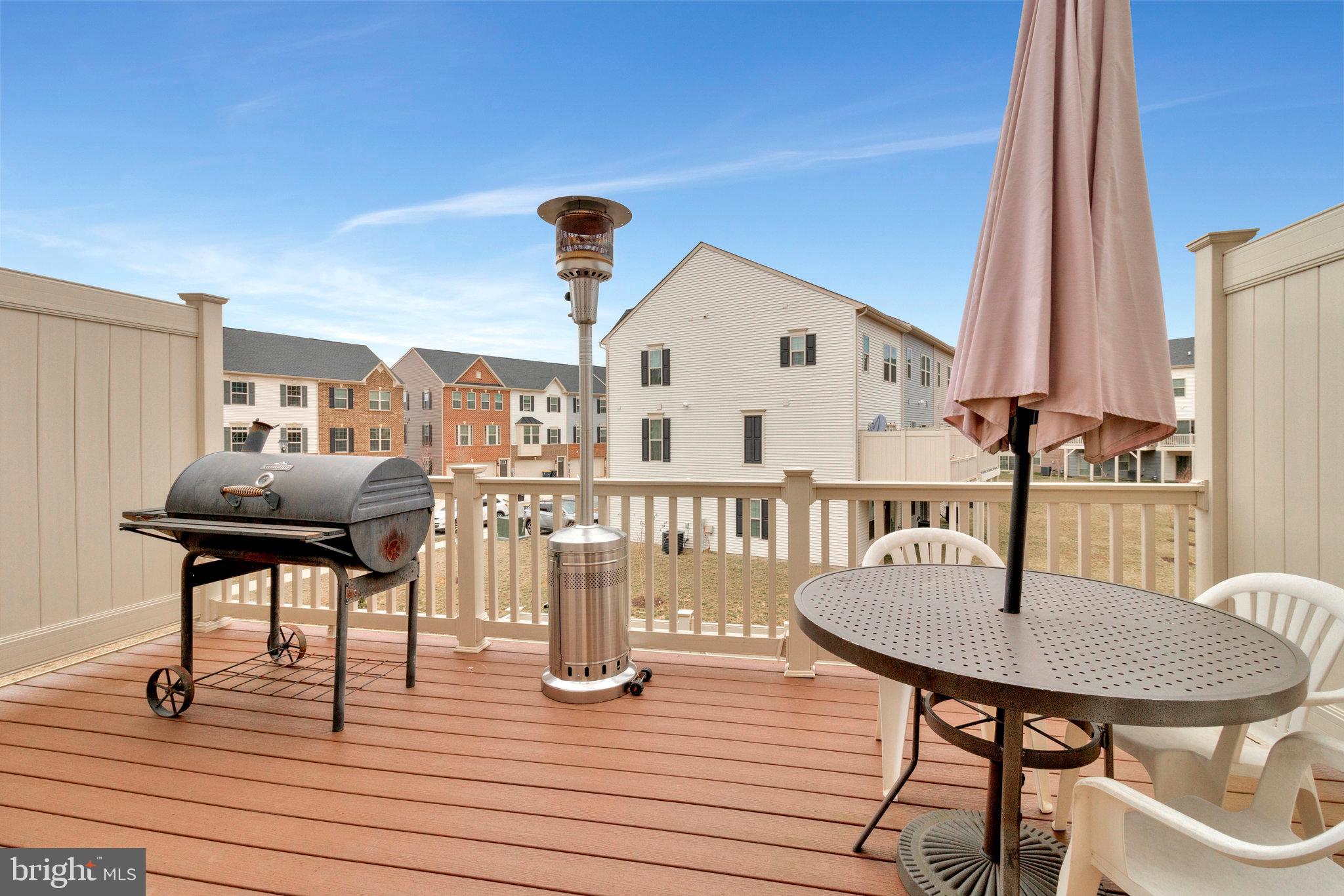 16504 Caribbean Way Accokeek, MD 20607 - Photo 23 of 29 a view of a dining room with furniture and wooden floor