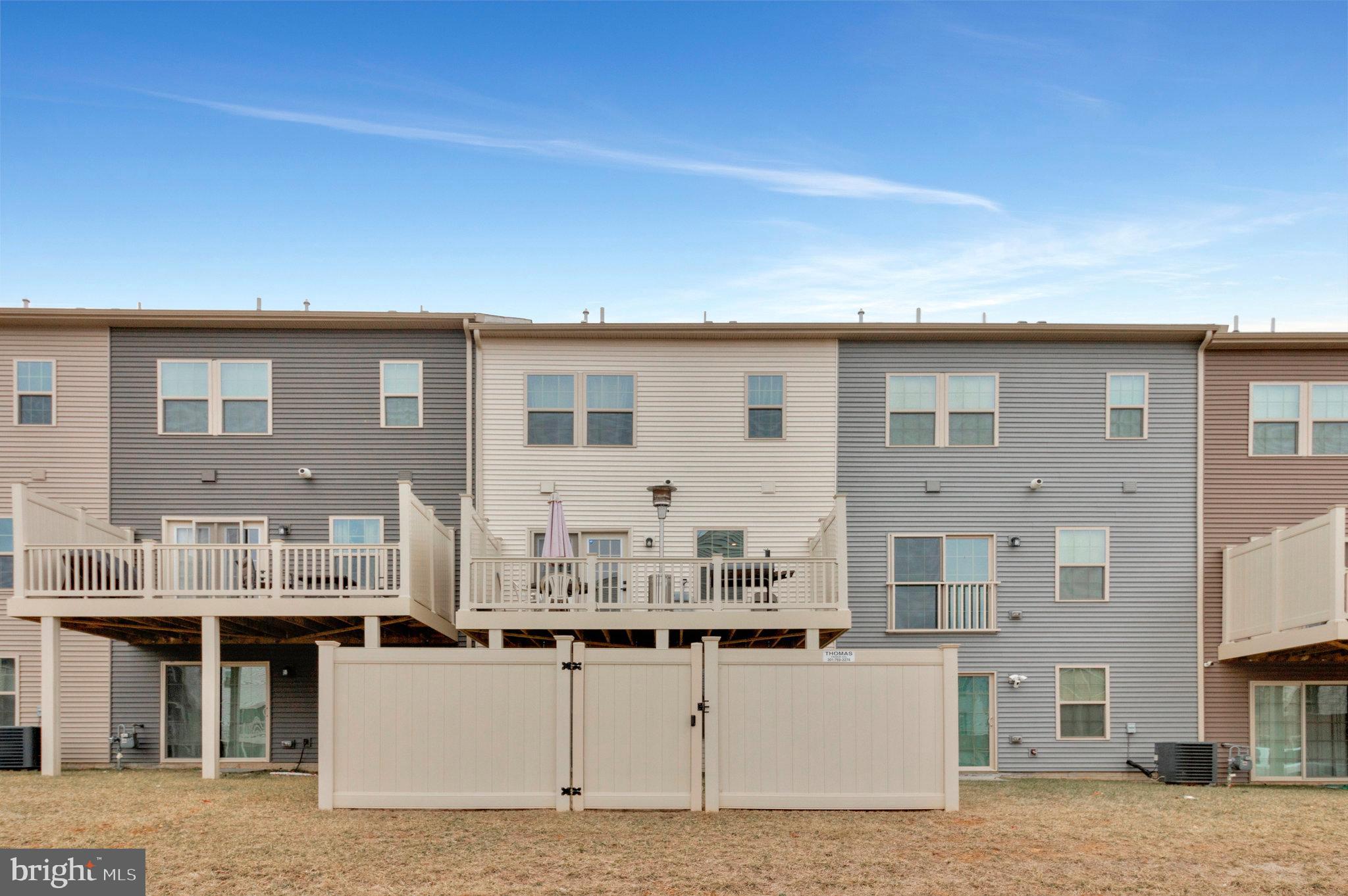 16504 Caribbean Way Accokeek, MD 20607 - Photo 25 of 29 a front view of building with yard