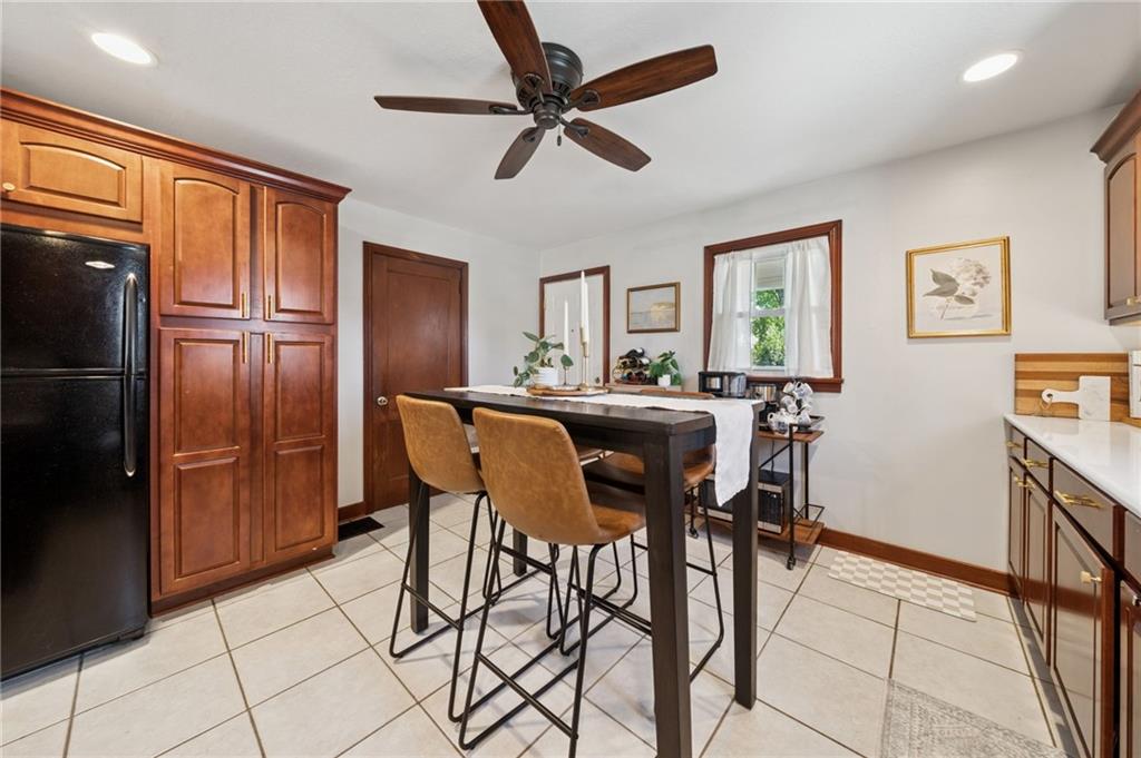 135 Pear Orchard Road Coraopolis, PA 15108 - Photo 16 of 43 a view of a dining room with furniture and a refrigerator