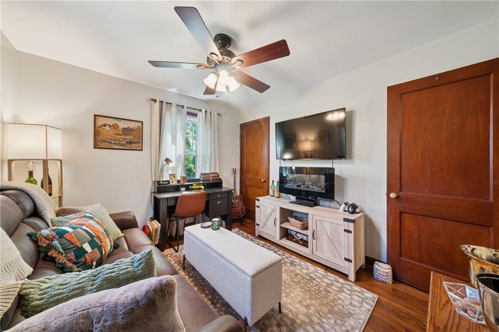 135 Pear Orchard Road Coraopolis, PA 15108 - Photo 19 of 43 a living room with furniture and a flat screen tv