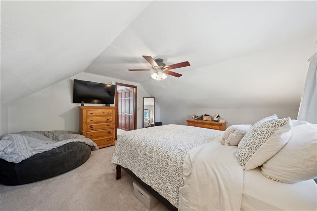 135 Pear Orchard Road Coraopolis, PA 15108 - Photo 25 of 43 a bedroom with a bed and a television