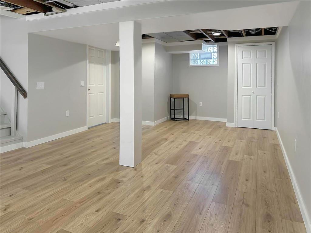 135 Pear Orchard Road Coraopolis, PA 15108 - Photo 32 of 43 a view of an empty room with wooden floor