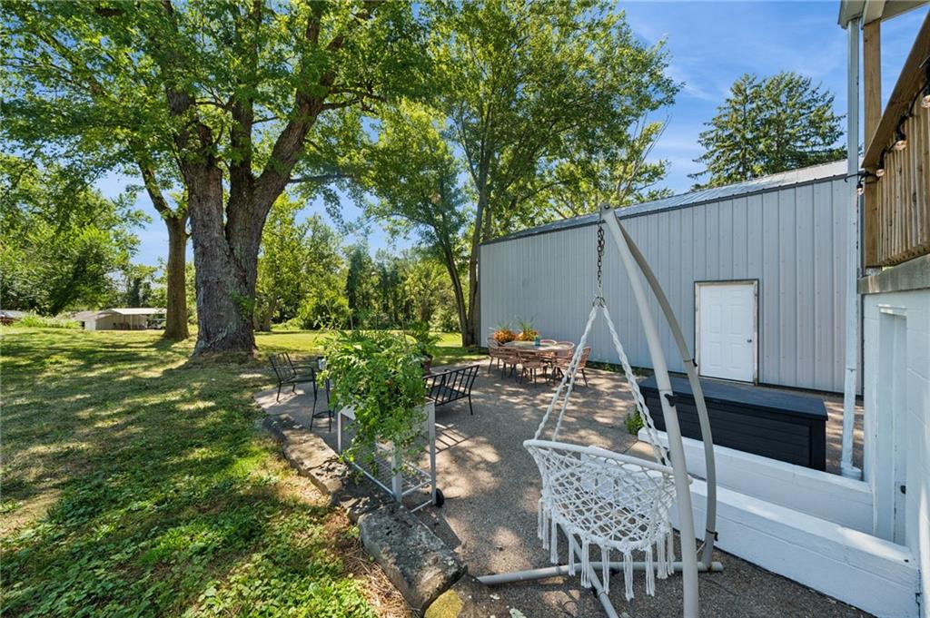 135 Pear Orchard Road Coraopolis, PA 15108 - Photo 40 of 43 a view of backyard with table and chairs and potted plants
