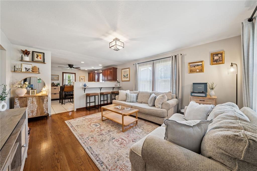 135 Pear Orchard Road Coraopolis, PA 15108 - Photo 8 of 43 a living room with furniture and wooden floor